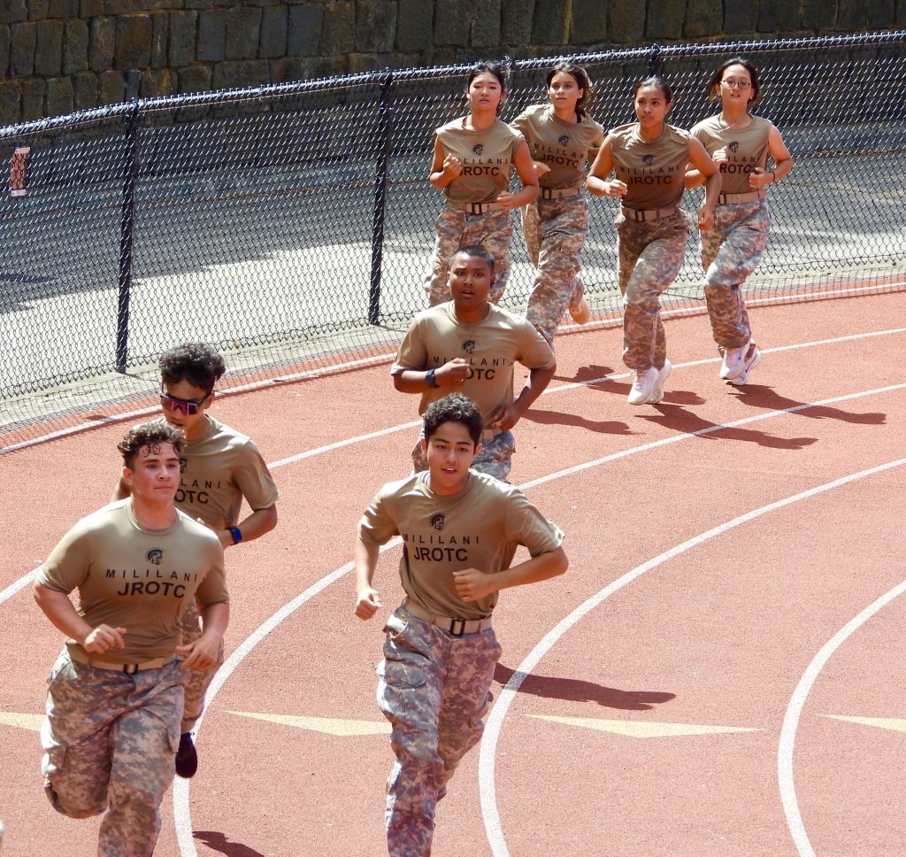 Male and female teams finishing the last 1/4 mile of the 1.5 mile campus run