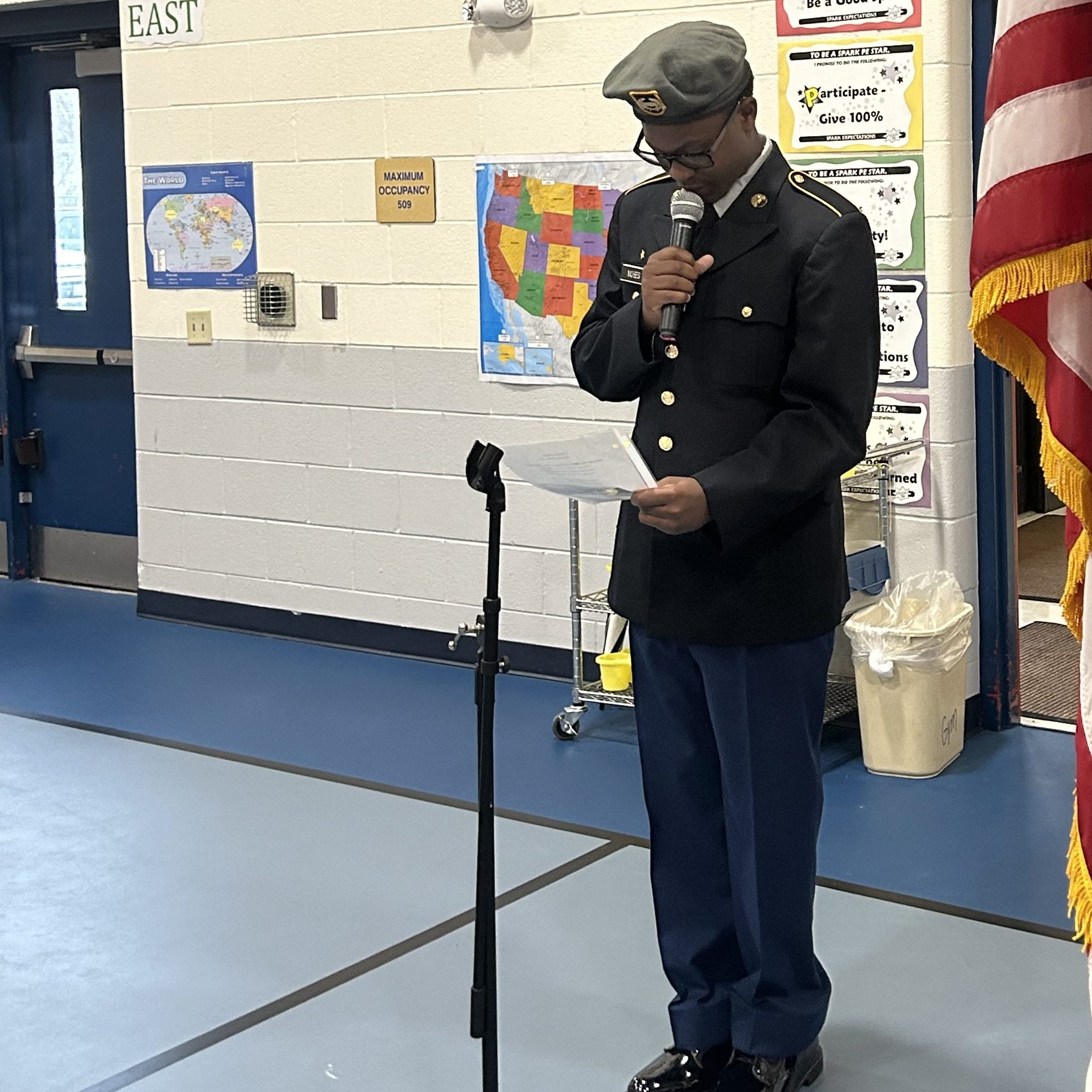 C/PVT Charlie Moses reads a poem to honor veterans