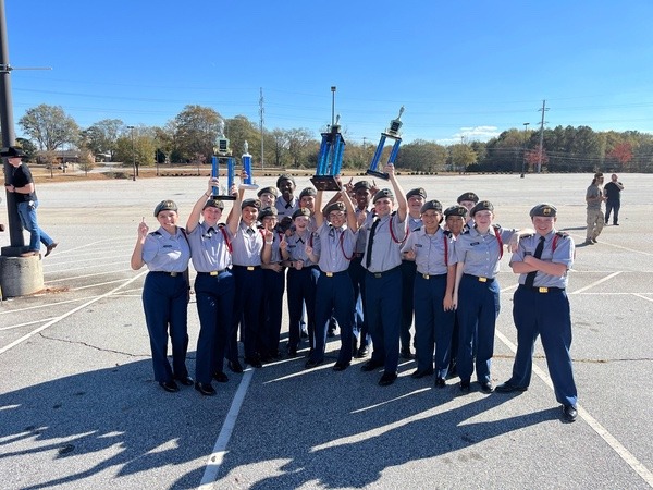 The Hopewell Drill Team celebrating their victory