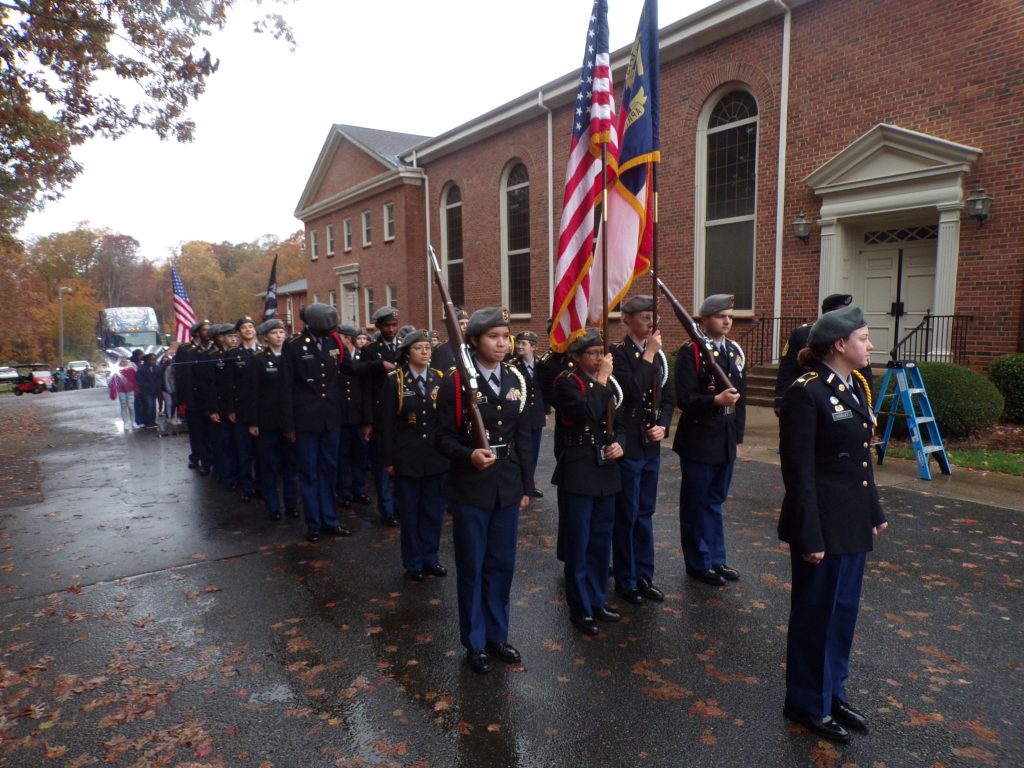 Titan Battalion Cadets led by C/MAJ Lilian Hoblet preparing for the Huntersville Parade