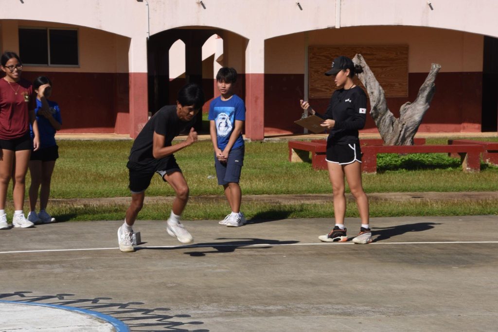 Group of Cadets performing shuttle-run exercises.