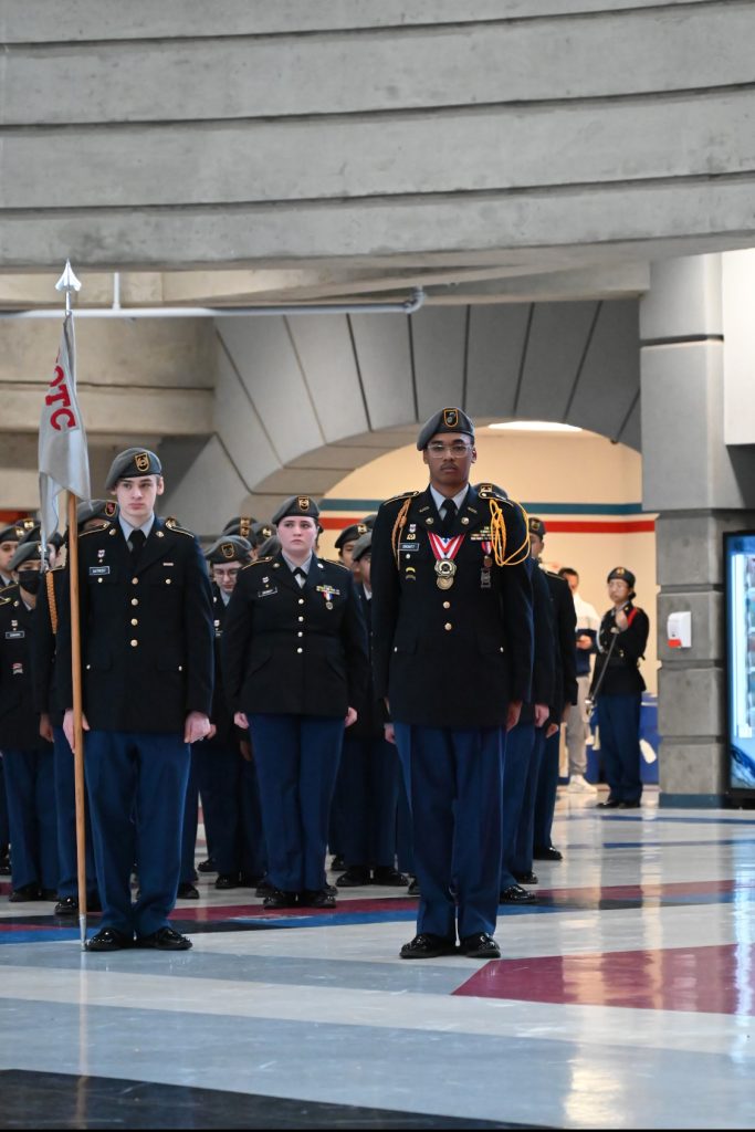 C/CPT Orchitt and his Guidon Bearer of Bravo Company Stand Ready