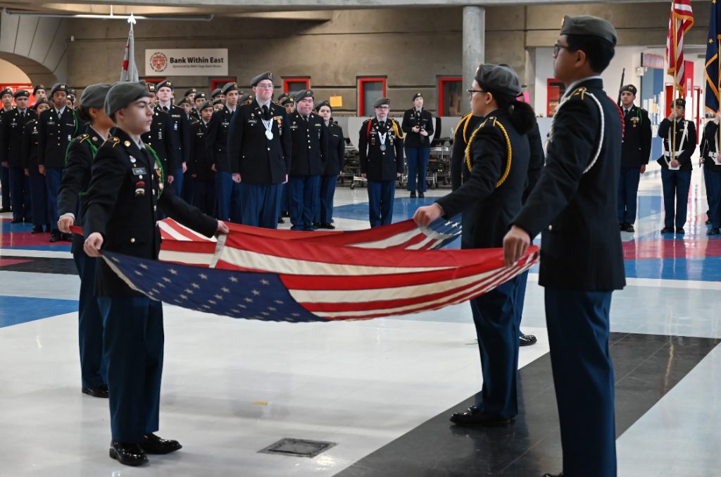 The Flag Presentation Team Prepares the first flags for retirement