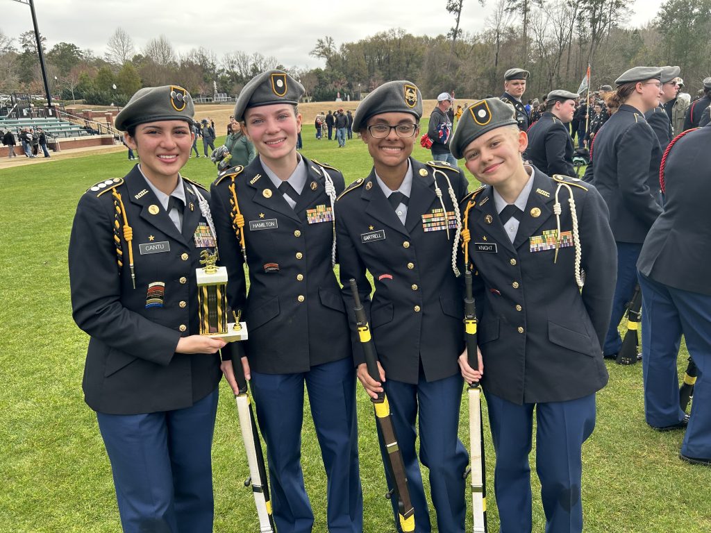 The Harris County High School Female Color Guard included Sophia Cantu, Summer Knight, Dana Gartrell, and Kaydi Hamilton.