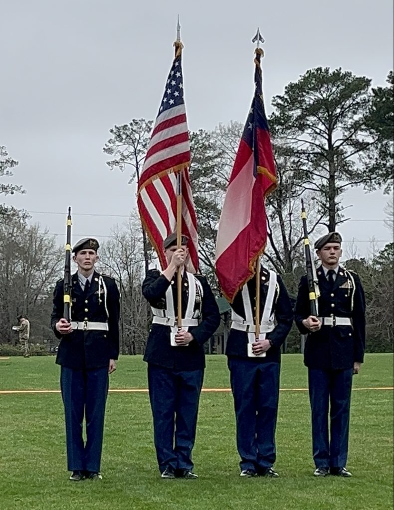 Members of the Harris County High School Male Color Guard are Adam Aut, Zachary Williams, Richard Courterier, and Kevin Porter.