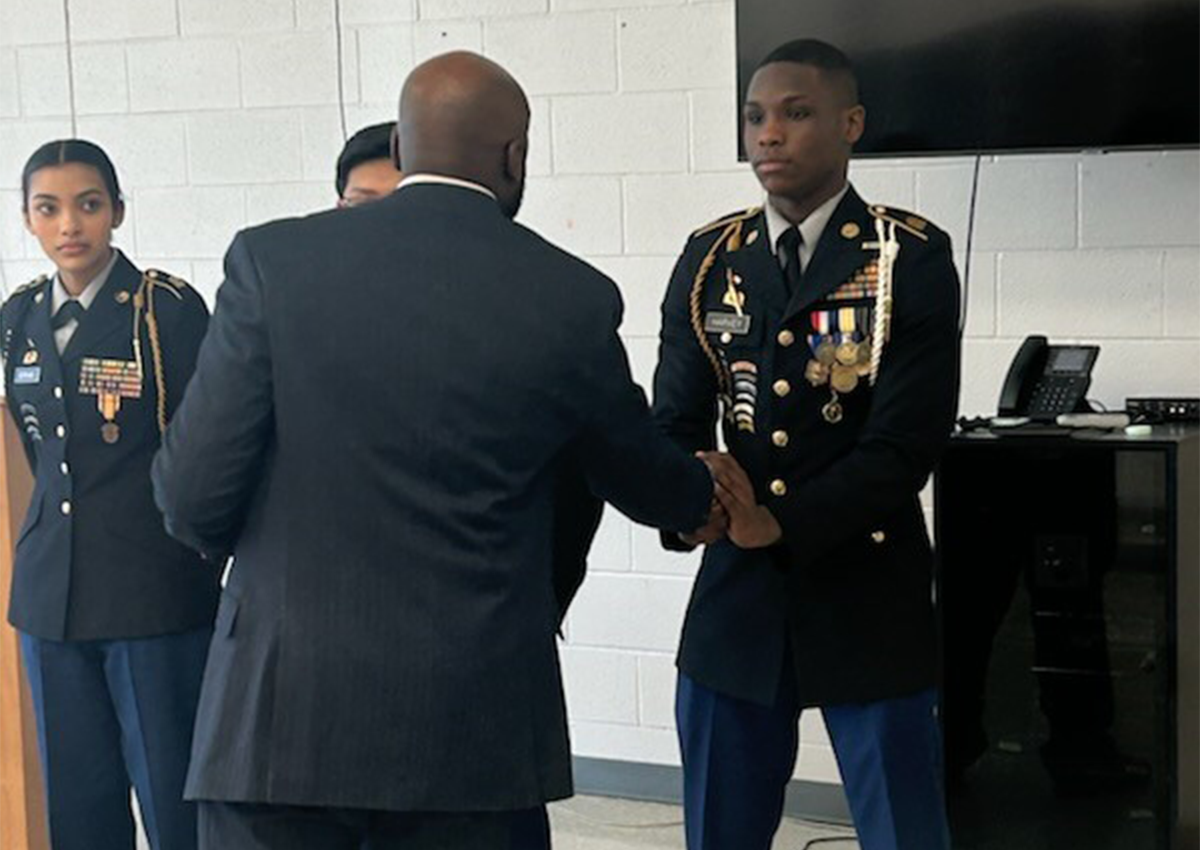 4th Brigade, Operations and Training Chief, Mr. Diron Reynolds presents awards to UHS Cadets during their JPA