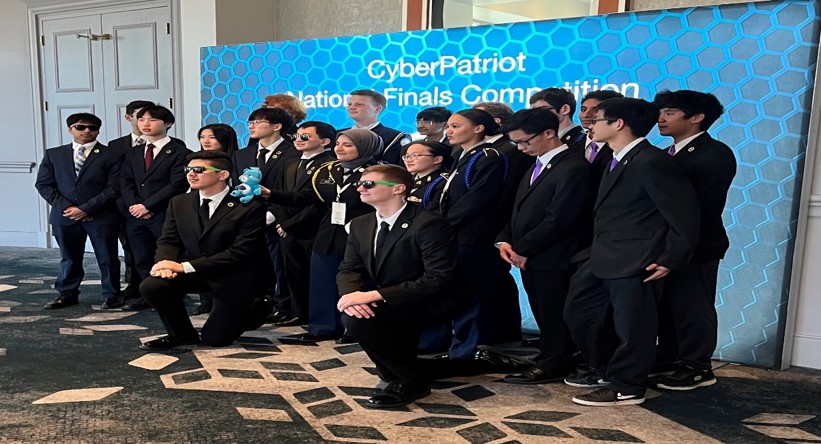 JROTC Cadets pose with other teams after the competition. Many new friendships were made amongst the competitors.
