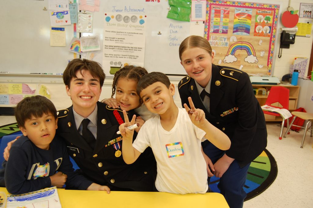 Cadets Daniel Freund and Alyssa Cerula setting a positive example the Kindergarten Class.