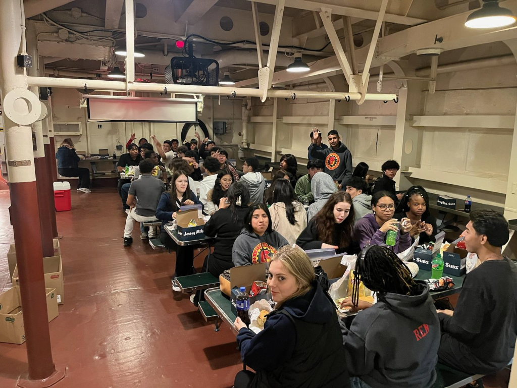 Cadets eating lunch in the battleship's wardroom.