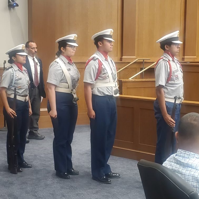 The Olympic High School JROTC Color Guard witnessing the Naturalization Ceremony take place.
