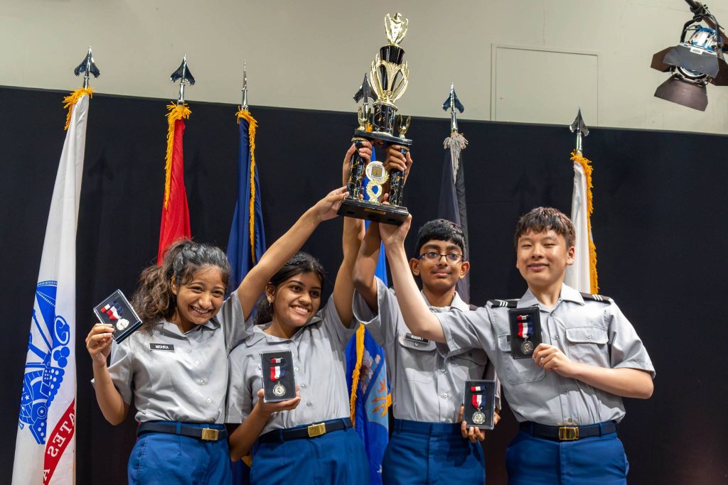 The Army JROTC Academic Team from Ravenwood High School celebrates their third place finish in the Army Academic Bowl on June 24 in Washington. After two days of competition, the top JROTC teams representing the Army, Navy, Air Force, and Marine Corps met on a national stage to determine a champion in a Jeopardy-style competition. | U.S. Army photo by Sarah Windmueller