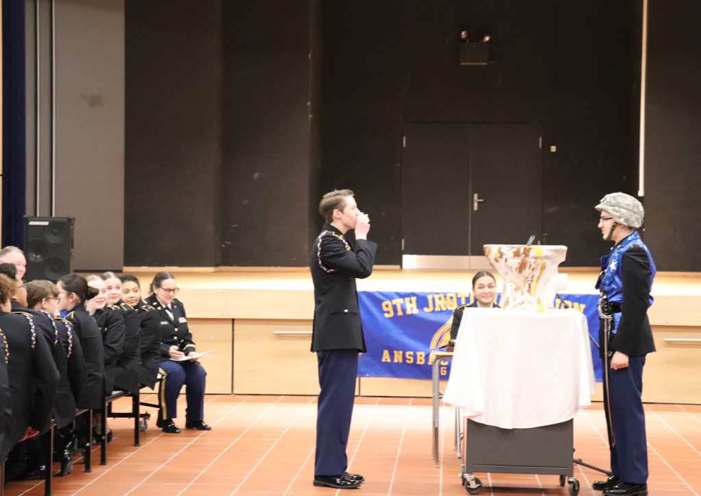 (at table) 9th JROTC Cadets and instructors (Standing left to right: Cdt/SGT Kael Clark and Cdt/SSG Marlin McCaskill