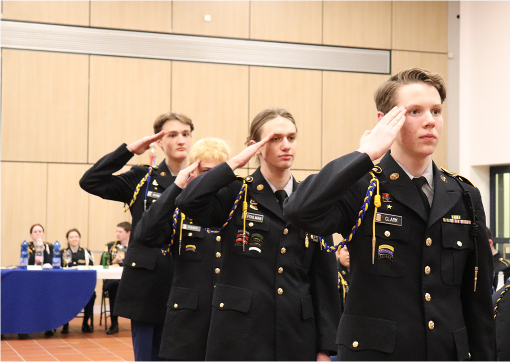 (left to right): Cdt/SGT Kael Clark, Cdt/2LT Alexander Pohlman, Cdt/PVT Tate Wollenzien, and Cdt/SSG Carter Haynes
Cadets salute the grog bowl prior to being served grog.