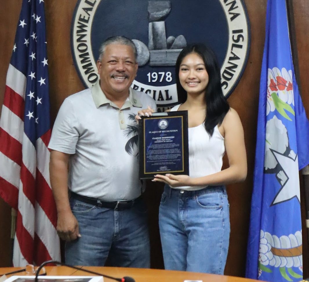 C/MAJ Clarize Rodriguez holding her plaque of recognition with Mayor Edwin Aldan