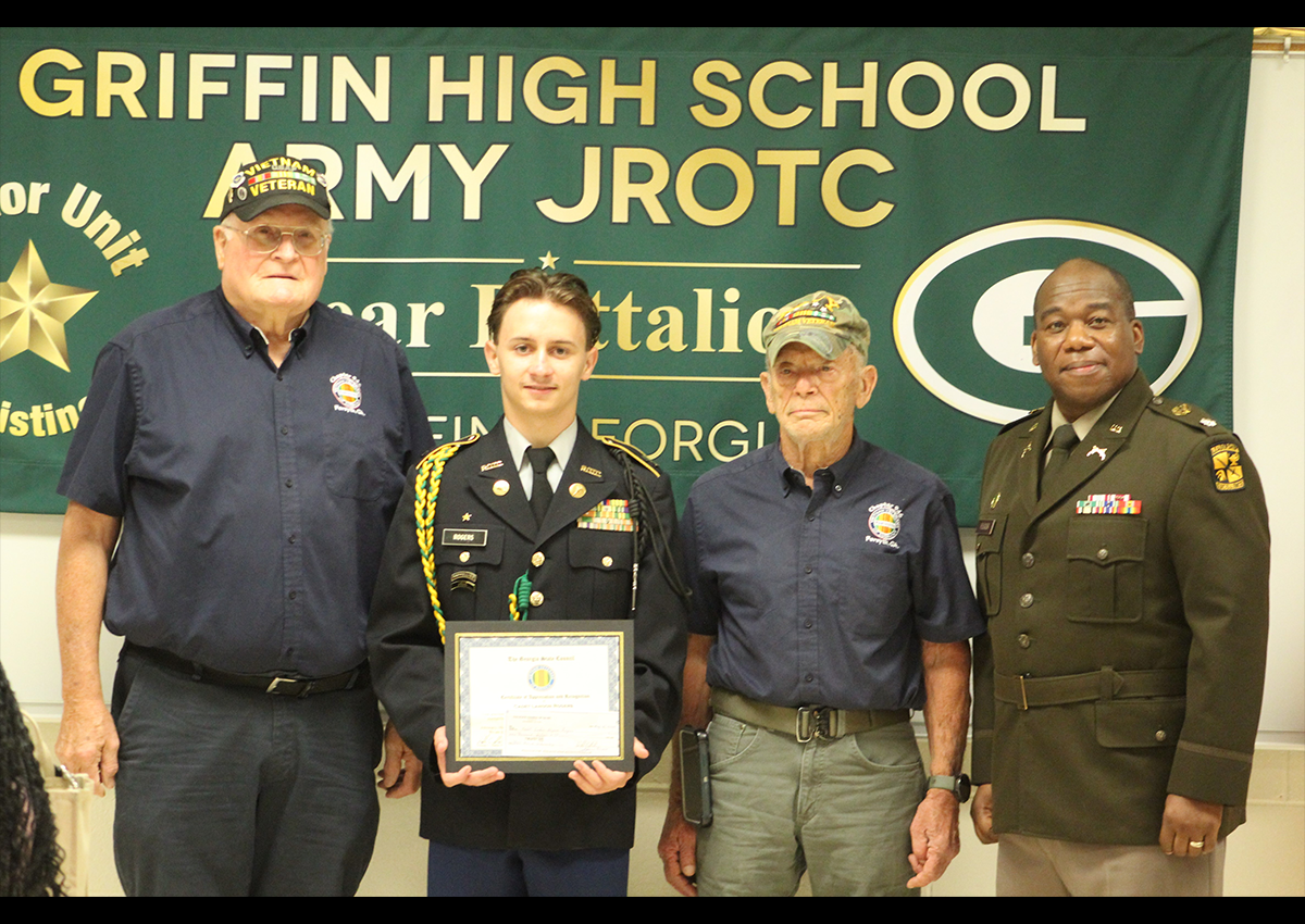 Vietnam Veterans of America Chapter 946 President Martin Ursitti and Vice President Mike Kuhr present a $1,000 scholarship to Cadet Landon Rogers. Also pictured (far right) is retired Lt. Col Nathaniel Flegler Jr., the senior Army Instructor of Griffin High’s JROTC program.