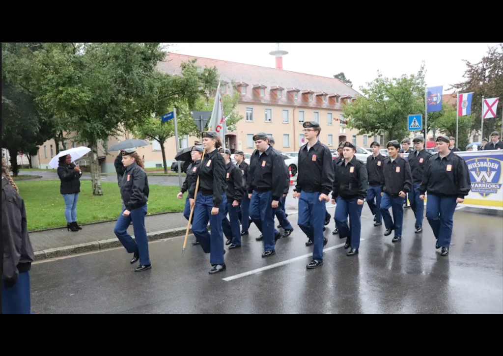 The Warrior Battalion Color Guard, commanded by C/SSG Provost, leads the parade. (Photo take by C/CPL Preston Blake)