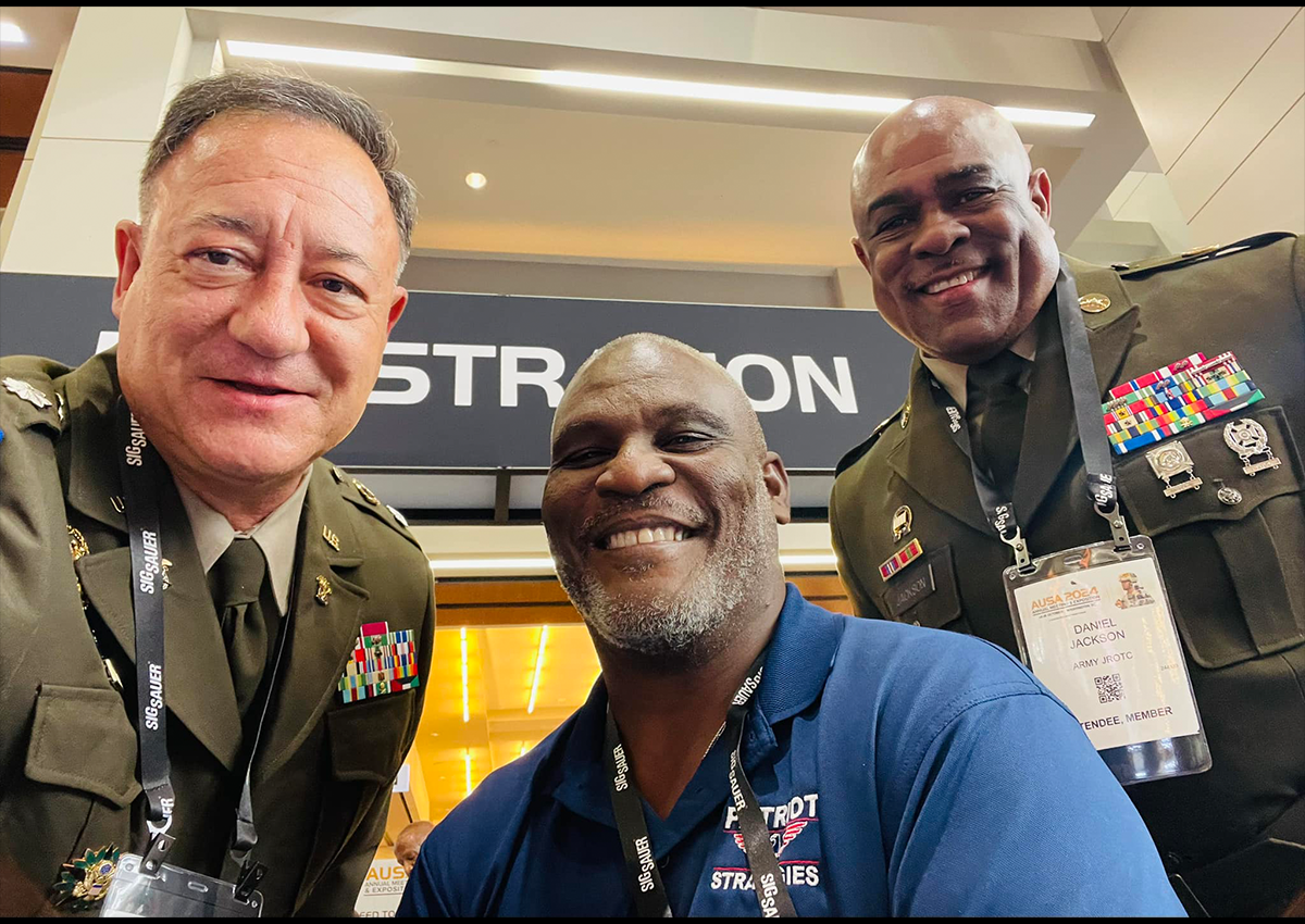 Woodbridge Senior High School JROTC Instructors LTC (Ret) Osborn and 1SG (Ret) Jackson enjoy at moment with "Battleship" Actor, COL (Ret) Gregory Gadson at AUSA 2024.
