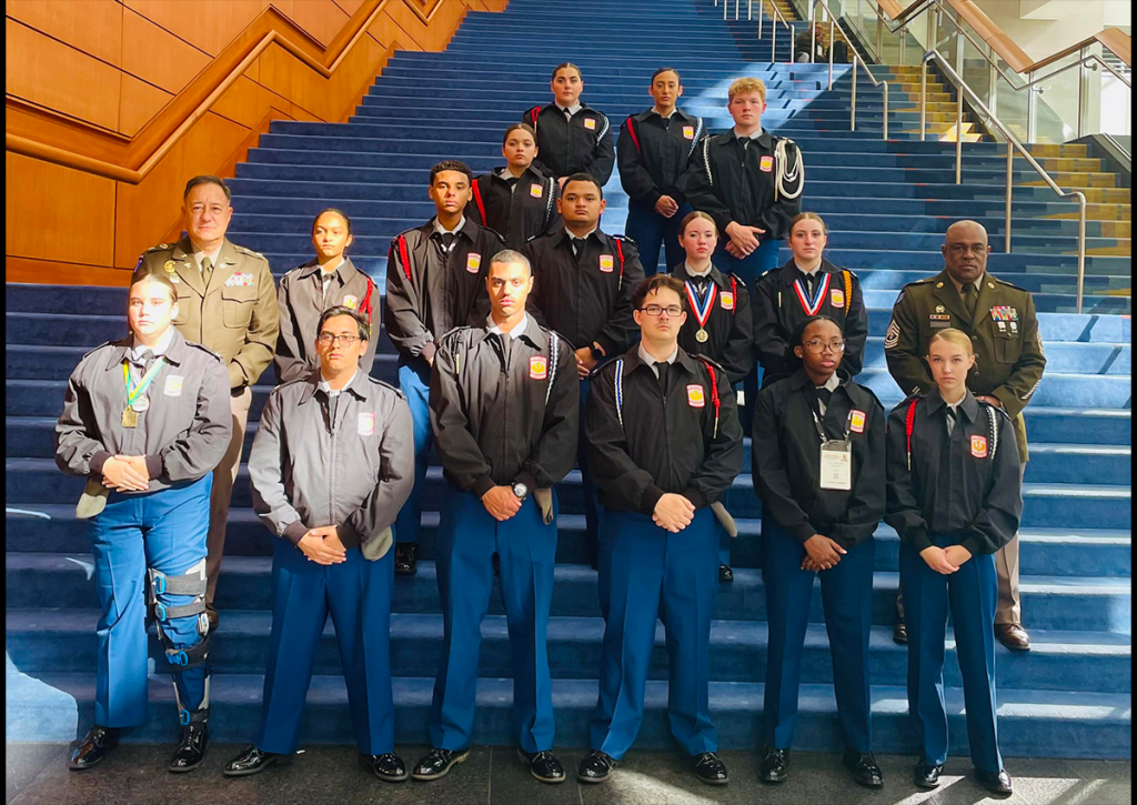 Woodbridge Senior High School JROTC Viking Battalion pose for their annual tradition of taking a group photo on the stairs of the Walter E. Washington Convention Center at AUSA 2024.