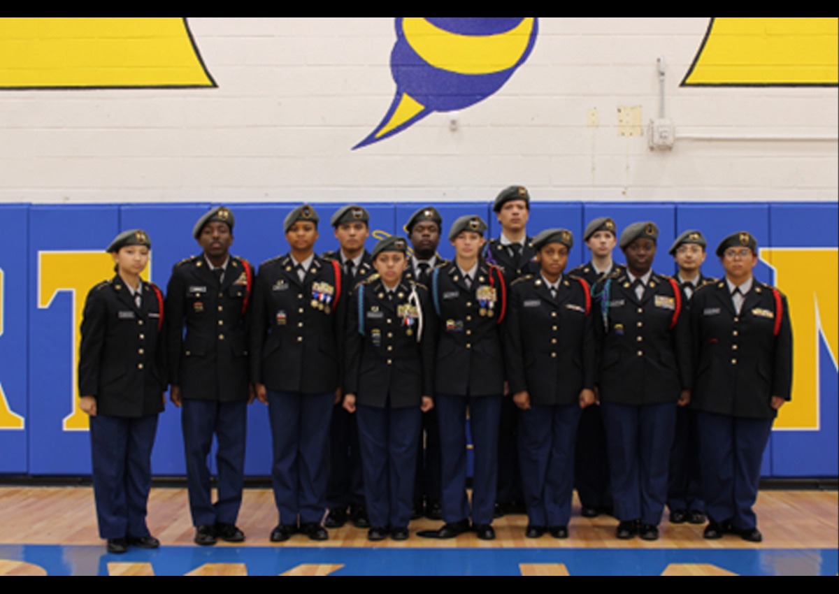 The Battalion posing for their victory photo