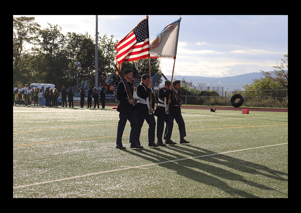 CG1.JPG- C/1LT Cathrine Mellon commands the Wiesbaden homecoming football game color guard (Photo taken by SGM (Ret) Allen Ashton)