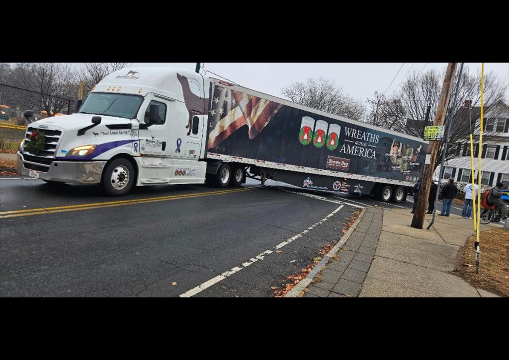 Convoy departing Hillhouse High School