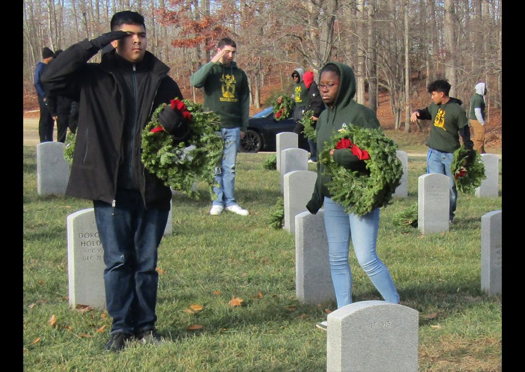 Cadets honor every service member by rendering a salute after placing the wreath upon their grave.