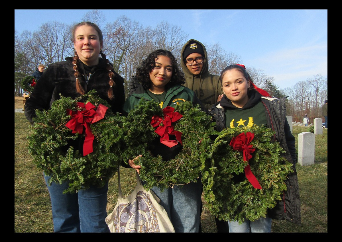 With wreaths in hand, cadets receive their assigned areas to place the symbol of the season and honor service members.