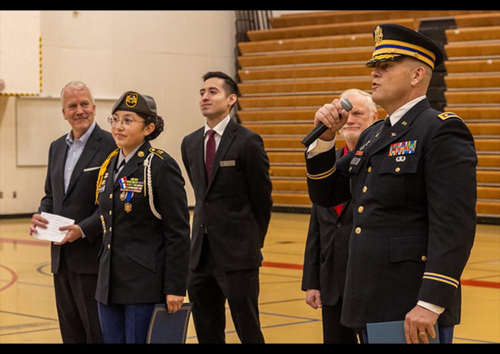 Major Erskine addressing the area cadets with Principal Rodger Nicolls, Senator Sullivan, Dr. Bryantt, and the Awardee