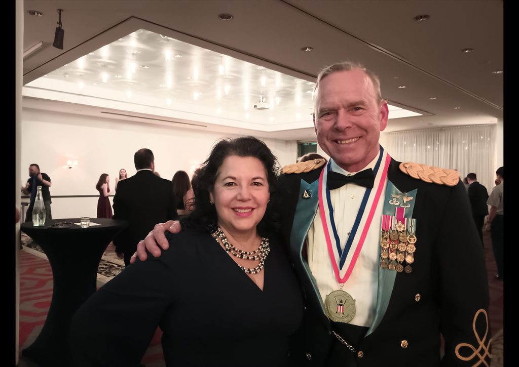 LTC (Ret) Jon A. Ring and his wife Mary Ring happily posing for a photo after he was awarded the Gold Presidential Volunteer Service Award.