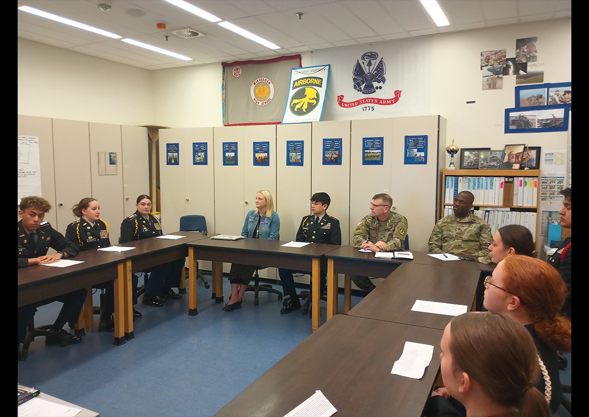 First photo is The Warrior Battalion Command and Staff brief the USAG Commander, CSM, and Wiesbaden High School Principal in preparation for impending JPA (Photo taken by LTC (Ret) Jon A. Ring)