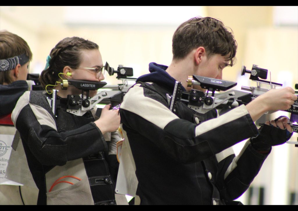 (Pictured above, Cadets Cydnee Lassiter and Aiden Sweney firing from a standing position)
Captions were written by Cadet/SFC Trevor J.P. Savage.