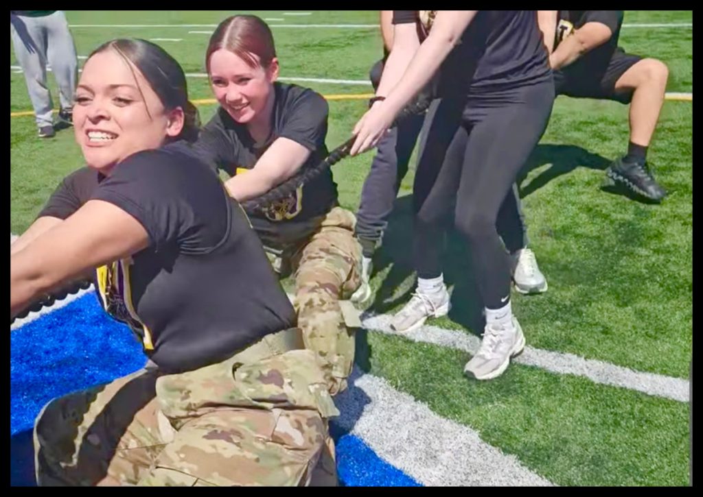2. Woodbridge JROTC Viking Battalion pose after receiving the First Place Trophy for Sports Day Competition.