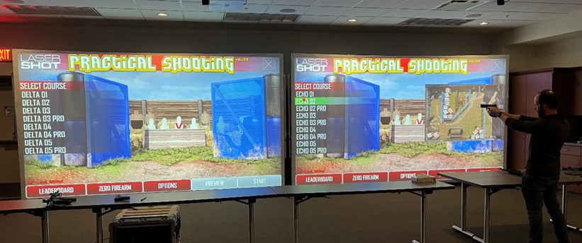 In between matches, Cadets, parents, and spectators could try their skills at the pistol and rifle competition simulator.