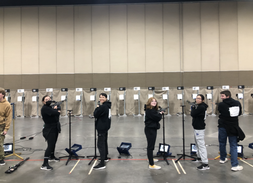 Farmington HS, NM's Army JROTC team in standing position for sporter