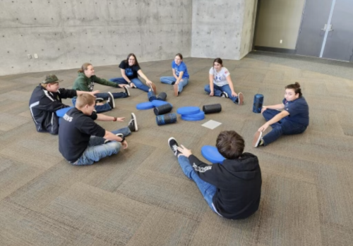Lebanon High School Cadets from Oregon doing warm-up exercises to prepare for the competition